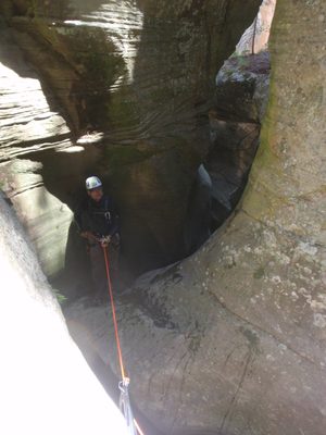 Andy on the second to last rappel, which involved going...