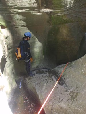 Monica watches Meredith rappel.