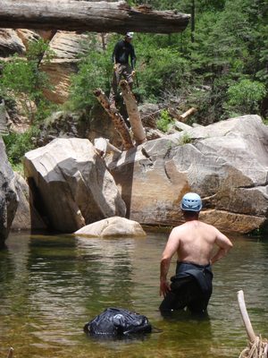 Andy moves into position to take the plunge into a small...
