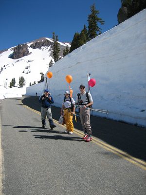 Niels, Catherine, and some guy hike up the (closed) road...