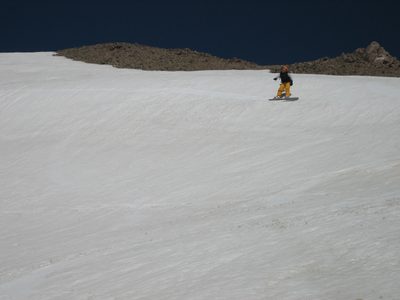 On a short traverse below a rocky outcropping.