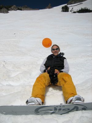 Portrait of a snowboarder who doesn't want the day to end.