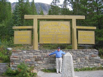 Peter straddling the continental divide in the Kootenai Natl Park