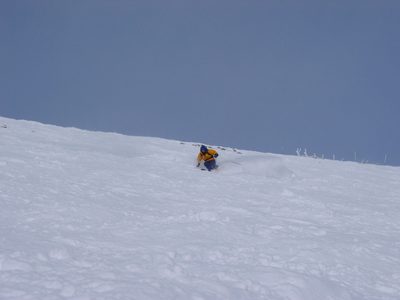 John skiing down through some okay powder.  Not bad for...