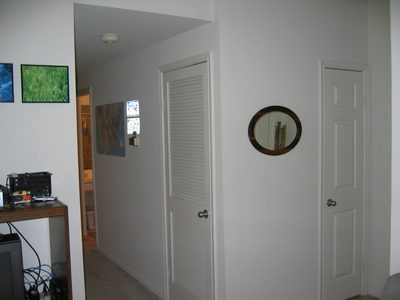 Looking down the hall towards bedroom with portion of...