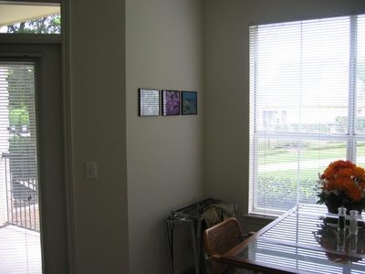Dining area with three more of Brooke's photos.
