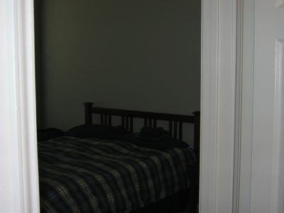 Entrance to bedroom across the hall from bath