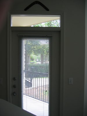 Door leading to the patio .. between the living room and...