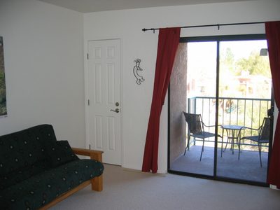 Which does have access to the aforementioned balcony