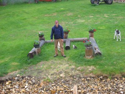 Along the river bank was a husky training camp.  The...