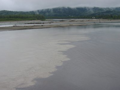 A spot along the river where clear water (on the right)...
