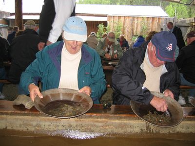 Has Dad found something?  I see gold in my pan!