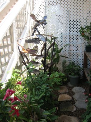 Fountain made from farm implements (mainly shovels) in...