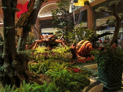 More enormous creatures in scale with the flowers.