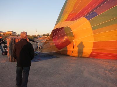 Now the flame thrower starts heating the air in the balloon.