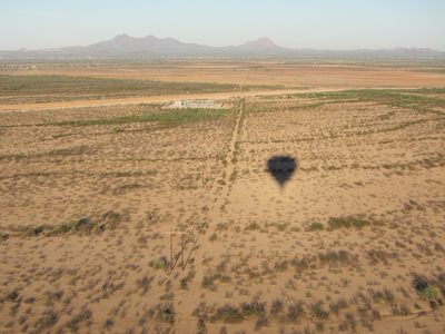 More of the land we were crossing with our own shadow.