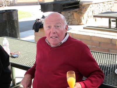 Dad enjoying his mimosa at our post-flight breakfast.