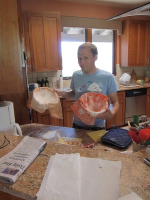 Two empty rising bowls, so the bread must be in the oven