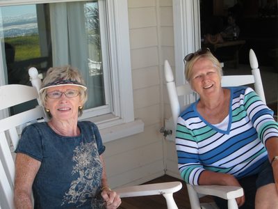Joan with Meg barely able to keep her eyes open
