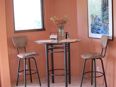 Kitchen table (bar height) to take advantage of the...