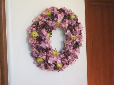 Unusual colors in a Christmas wreath, but they work...