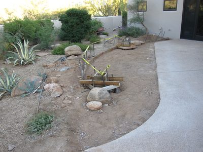 New vertical post foundations being set.