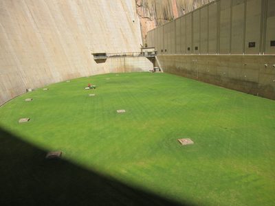 The grass (see the guy mowing)is primarily to keep dust...