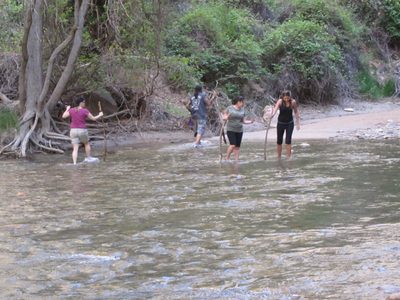 A few hearty folk venturing into the river where the...