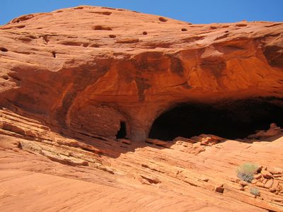 Interesting dwellings at the top of a slope.  Larsen...
