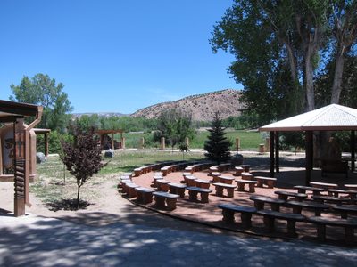 Outdoor seating at Chimayo.  The crystal blue high...