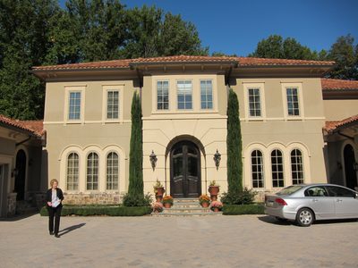 Aunt Judy in front of the new house in McLean Virginia