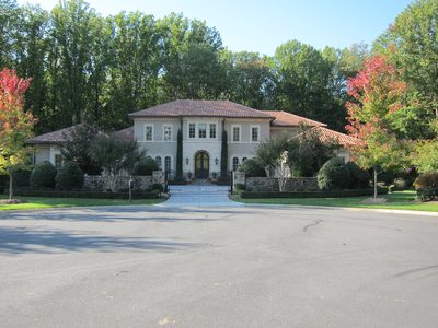 Full view of Page house, with gate closed.  It was a...