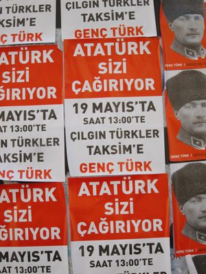 Back on the street, there were many posters for the...