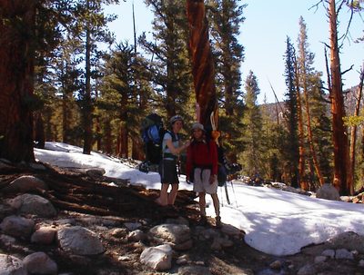 Rachel and John taking a rest.  Niels' backpack (with...