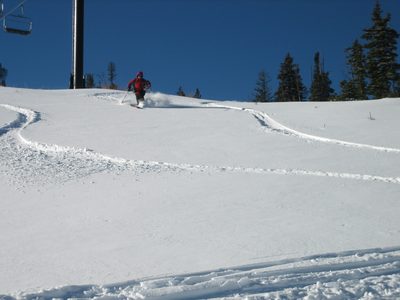 John left foot forward under the Iron Horse lift,...