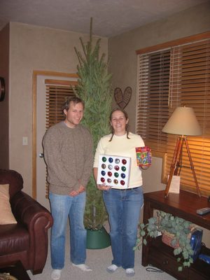John and Catherine and ornaments and lights.