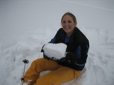 Catherine is quite pleased to have a little snow brick...