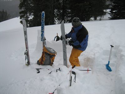 Catherine, putting her split board in downhill mode. ...