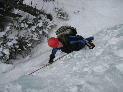 Catherine examining her ice tool placement.