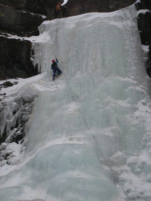 Catherine approaching the final crux, Joe looking on.