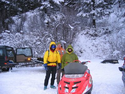 John, Joe and Catherine line up behind the snowmobiles...