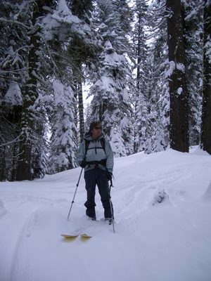 Al, using his split board as skis.