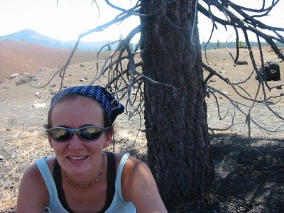 Rachel, seeking shade under the only tree for miles in...