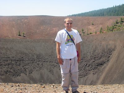 John at the top of Cinder Cone, in front of the crater.