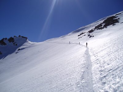 The team on the final icy traverse to Kearsarge Pass on...