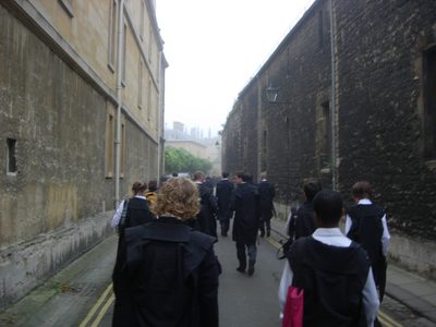 Proceeding en masse down New College Road to the...